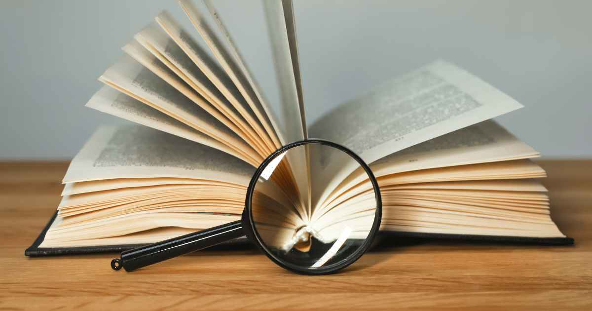 Book and magnify glass