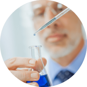 Man with vial in a lab