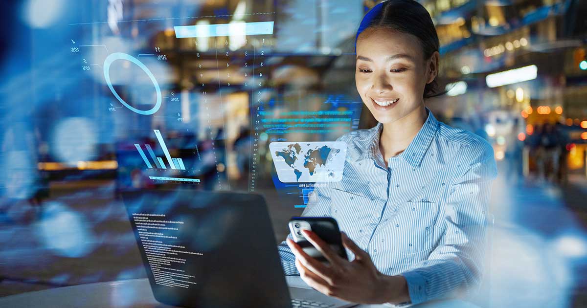 woman smiling using devices