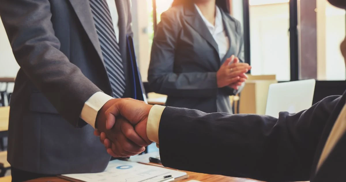 Business people shaking hands