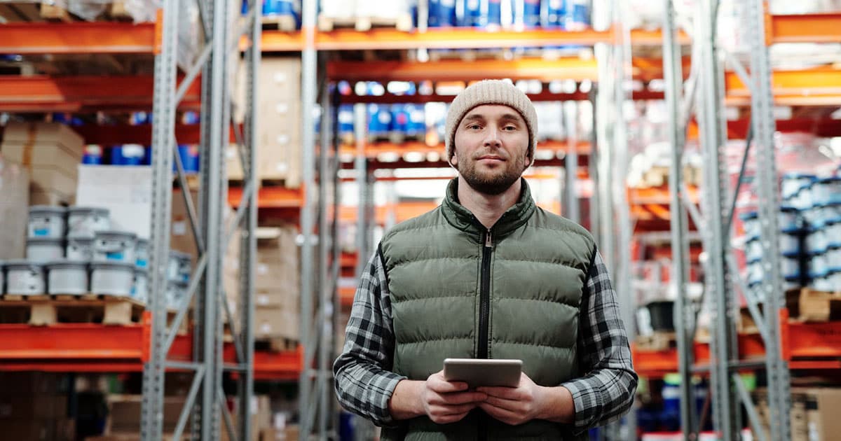image2-blog032525 man in warehouse with tablet