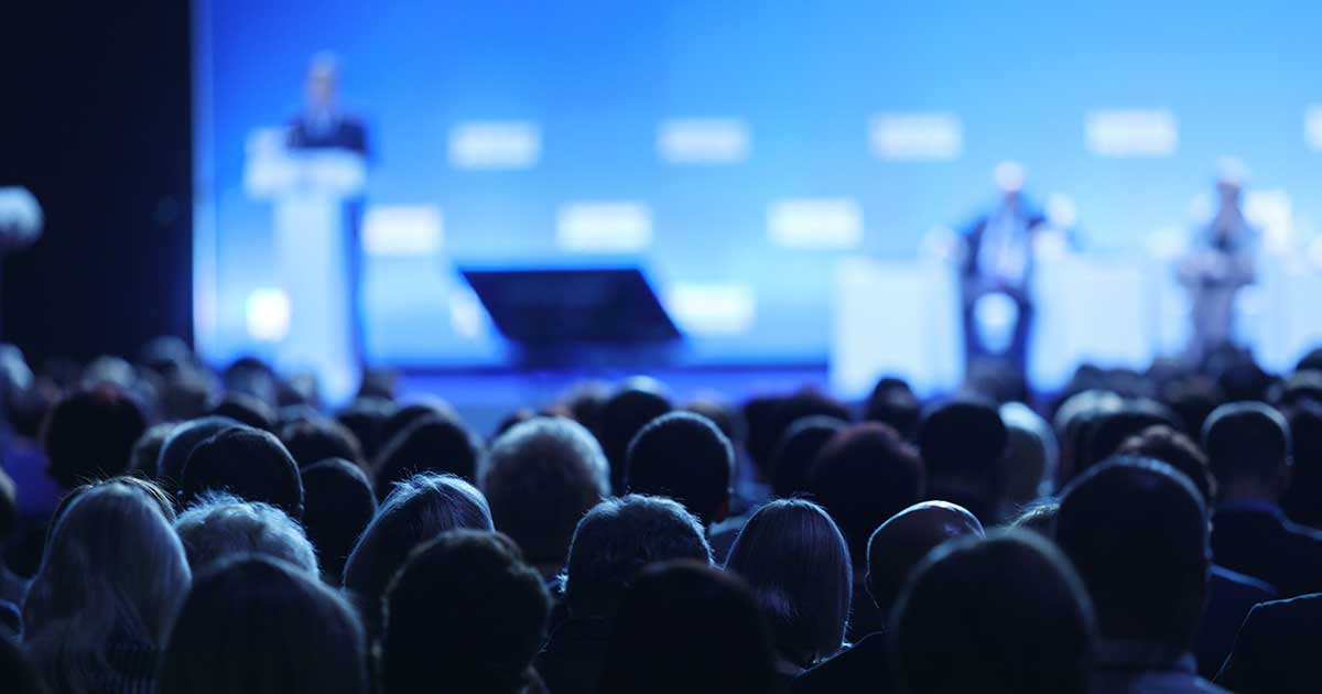 people looking at a stage